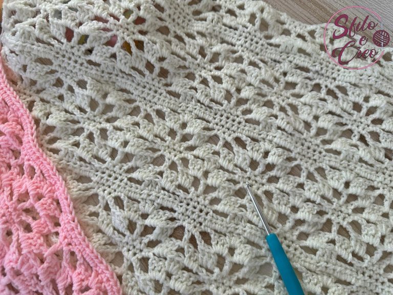 Punto traforato con rombi e righe